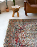 Vintage Turkish rug in living room setting, old rug, antique rug, pastel colors, faded colors, Turkish rug, vintage rug, soft rug, Portland, Oregon, rug store, rug shop, local shop
