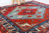 Vintage Turkish rug in a living room setting, pile rug, Turkish rug, vintage rug, portland, rug shop, bright colors, wild shaman, soft rug, bold color, Portland, Oregon, rug store, rug shop, local shop, antique rug