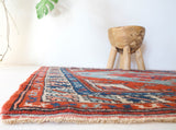 Vintage Turkish rug in a living room setting, pile rug, Turkish rug, vintage rug, portland, rug shop, bright colors, wild shaman, soft rug, bold color, Portland, Oregon, rug store, rug shop, local shop, antique rug