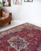 Vintage Turkish rug in living room setting, old rug, antique rug, pastel colors, faded colors, Turkish rug, vintage rug, soft rug, Portland, Oregon, rug store, rug shop, local shop