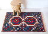 Vintage mini kilim rug in room decor setting, kilim, Turkish rug, vintage rug, portland, rug shop, bright colors, wild shaman, soft rug, bold color, Portland, Oregon, rug store, rug shop, local shop