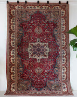 Vintage Turkish rug in living room setting, old rug, antique rug, pastel colors, faded colors, Turkish rug, vintage rug, soft rug, Portland, Oregon, rug store, rug shop, local shop