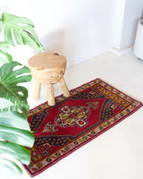 Vintage mini kilim rug in room decor setting, kilim, Turkish rug, vintage rug, portland, rug shop, bright colors, wild shaman, soft rug, bold color, Portland, Oregon, rug store, rug shop, local shop