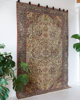 Vintage Turkish rug in living room setting, old rug, antique rug, pastel colors, faded colors, Turkish rug, vintage rug, soft rug, Portland, Oregon, rug store, rug shop, local shop