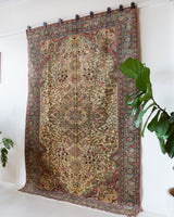 Vintage Turkish rug in living room setting, old rug, antique rug, pastel colors, faded colors, Turkish rug, vintage rug, soft rug, Portland, Oregon, rug store, rug shop, local shop