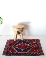 Vintage Turkish rug in a living room setting, pile rug, Turkish rug, vintage rug, portland, rug shop, bright colors, wild shaman, soft rug, bold color, Portland, Oregon, rug store, rug shop, local shop, antique rug