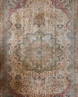 Vintage Turkish rug in living room setting, old rug, antique rug, pastel colors, faded colors, Turkish rug, vintage rug, soft rug, Portland, Oregon, rug store, rug shop, local shop