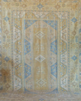 Vintage Turkish rug in living room setting, old rug, antique rug, pastel colors, faded colors, Turkish rug, vintage rug, soft rug, Portland, Oregon, rug store, rug shop, local shop