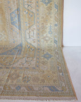 Vintage Turkish rug in living room setting, old rug, antique rug, pastel colors, faded colors, Turkish rug, vintage rug, soft rug, Portland, Oregon, rug store, rug shop, local shop