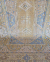 Vintage Turkish rug in living room setting, old rug, antique rug, pastel colors, faded colors, Turkish rug, vintage rug, soft rug, Portland, Oregon, rug store, rug shop, local shop