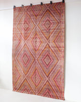 Vintage kilim rug in living room setting, old rug, antique rug, pastel colors, faded colors, Turkish rug, vintage rug, soft rug, Portland, Oregon, rug store, rug shop, local shop