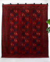 Antique Turkmen rug in a living room setting, pile rug, Turkish rug, vintage rug, portland, rug shop, bright colors, wild shaman, soft rug, bold color, Portland, Oregon, rug store, rug shop, local shop, antique rug