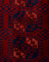 Antique Turkmen rug in a living room setting, pile rug, Turkish rug, vintage rug, portland, rug shop, bright colors, wild shaman, soft rug, bold color, Portland, Oregon, rug store, rug shop, local shop, antique rug