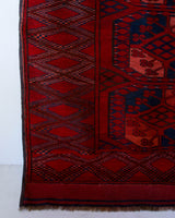 Antique Turkmen rug in a living room setting, pile rug, Turkish rug, vintage rug, portland, rug shop, bright colors, wild shaman, soft rug, bold color, Portland, Oregon, rug store, rug shop, local shop, antique rug