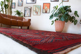Antique Turkmen rug in a living room setting, pile rug, Turkish rug, vintage rug, portland, rug shop, bright colors, wild shaman, soft rug, bold color, Portland, Oregon, rug store, rug shop, local shop, antique rug