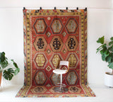 Vintage kilim rug in room decor setting, kilim, Turkish rug, vintage rug, portland, rug shop, bright colors, wild shaman, bold color, Portland, Oregon, rug store, rug shop, local shop, antique rug