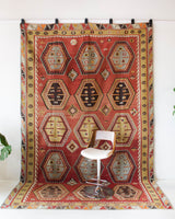 Vintage kilim rug in room decor setting, kilim, Turkish rug, vintage rug, portland, rug shop, bright colors, wild shaman, bold color, Portland, Oregon, rug store, rug shop, local shop, antique rug