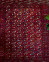 Antique Turkmen rug in a living room setting, pile rug, Turkish rug, vintage rug, portland, rug shop, bright colors, wild shaman, soft rug, bold color, Portland, Oregon, rug store, rug shop, local shop, antique rug