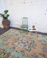old rug, antique rug, earthy colors, faded colors, Turkish rug, vintage rug, worn out rug, distressed rug, Portland, Oregon, rug store, rug shop, local shop, pile rug