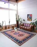 Vintage Turkish rug in a living room setting, pile rug, Turkish rug, vintage rug, portland, rug shop, bright colors, wild shaman, soft rug, bold color, Portland, Oregon, rug store, rug shop, local shop