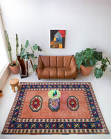 Vintage Turkish rug in a living room setting, pile rug, Turkish rug, vintage rug, portland, rug shop, bright colors, wild shaman, soft rug, bold color, Portland, Oregon, rug store, rug shop, local shop