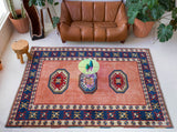 Vintage Turkish rug in a living room setting, pile rug, Turkish rug, vintage rug, portland, rug shop, bright colors, wild shaman, soft rug, bold color, Portland, Oregon, rug store, rug shop, local shop