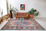 Vintage caucasian rug in a living room setting, pile rug, Turkish rug, vintage rug, portland, rug shop, bright colors, wild shaman, soft rug, bold color, Portland, Oregon, rug store, rug shop, local shop, soft rug, pastel colors, faded colors