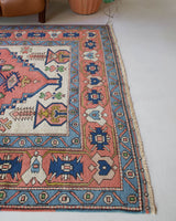Vintage caucasian rug in a living room setting, pile rug, Turkish rug, vintage rug, portland, rug shop, bright colors, wild shaman, soft rug, bold color, Portland, Oregon, rug store, rug shop, local shop, soft rug, pastel colors, faded colors