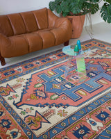 Vintage caucasian rug in a living room setting, pile rug, Turkish rug, vintage rug, portland, rug shop, bright colors, wild shaman, soft rug, bold color, Portland, Oregon, rug store, rug shop, local shop, soft rug, pastel colors, faded colors