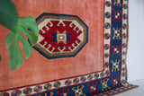 Vintage Turkish rug in a living room setting, pile rug, Turkish rug, vintage rug, portland, rug shop, bright colors, wild shaman, soft rug, bold color, Portland, Oregon, rug store, rug shop, local shop