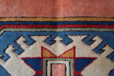 Vintage Turkish rug in a living room setting, pile rug, Turkish rug, vintage rug, portland, rug shop, bright colors, wild shaman, soft rug, bold color, Portland, Oregon, rug store, rug shop, local shop