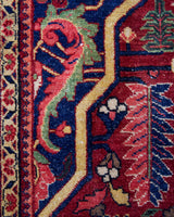 Antique Persian area rug in a living room setting, pile rug, vintage rug, portland, rug shop, bright colors, wild shaman, soft rug, bold color, Portland, Oregon, rug store, rug shop, local shop, antique rug, Persian rug, handmade rug, wool rug