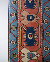 Vintage caucasian rug in a living room setting, pile rug, Turkish rug, vintage rug, portland, rug shop, bright colors, wild shaman, soft rug, bold color, Portland, Oregon, rug store, rug shop, local shop, soft rug, pastel colors, faded colors