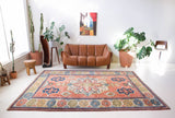 Vintage caucasian rug in a living room setting, pile rug, Turkish rug, vintage rug, portland, rug shop, bright colors, wild shaman, soft rug, bold color, Portland, Oregon, rug store, rug shop, local shop, soft rug, pastel colors, faded colors
