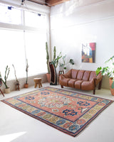 Vintage caucasian rug in a living room setting, pile rug, Turkish rug, vintage rug, portland, rug shop, bright colors, wild shaman, soft rug, bold color, Portland, Oregon, rug store, rug shop, local shop, soft rug, pastel colors, faded colors