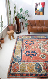 Vintage caucasian rug in a living room setting, pile rug, Turkish rug, vintage rug, portland, rug shop, bright colors, wild shaman, soft rug, bold color, Portland, Oregon, rug store, rug shop, local shop, soft rug, pastel colors, faded colors