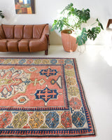 Vintage caucasian rug in a living room setting, pile rug, Turkish rug, vintage rug, portland, rug shop, bright colors, wild shaman, soft rug, bold color, Portland, Oregon, rug store, rug shop, local shop, soft rug, pastel colors, faded colors