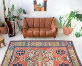 Vintage caucasian rug in a living room setting, pile rug, Turkish rug, vintage rug, portland, rug shop, bright colors, wild shaman, soft rug, bold color, Portland, Oregon, rug store, rug shop, local shop, soft rug, pastel colors, faded colors