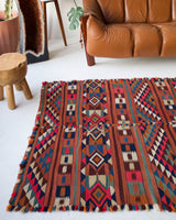 Vintage kilim rug in living room setting, bright colors, wild shaman, soft rug, bold color, Portland, Oregon, rug store, rug shop, local shop, vintage rug, modern kilim