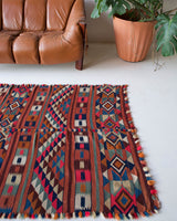 Vintage kilim rug in living room setting, bright colors, wild shaman, soft rug, bold color, Portland, Oregon, rug store, rug shop, local shop, vintage rug, modern kilim