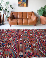 Vintage kilim rug in living room setting, bright colors, wild shaman, soft rug, bold color, Portland, Oregon, rug store, rug shop, local shop, vintage rug, modern kilim