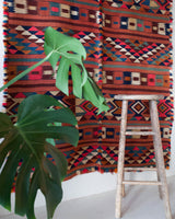 Vintage kilim rug in living room setting, bright colors, wild shaman, soft rug, bold color, Portland, Oregon, rug store, rug shop, local shop, vintage rug, modern kilim