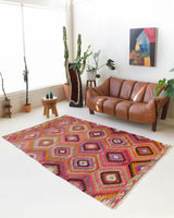 Vintage kilim rug in living room setting, bright colors, wild shaman, soft rug, bold color, Portland, Oregon, rug store, rug shop, local shop, vintage rug, modern kilim