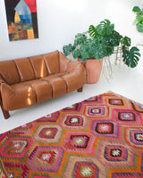 Vintage kilim rug in living room setting, bright colors, wild shaman, soft rug, bold color, Portland, Oregon, rug store, rug shop, local shop, vintage rug, modern kilim