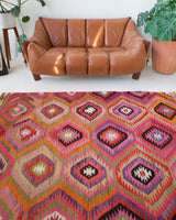 Vintage kilim rug in living room setting, bright colors, wild shaman, soft rug, bold color, Portland, Oregon, rug store, rug shop, local shop, vintage rug, modern kilim