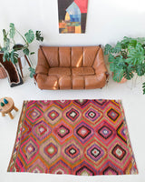 Vintage kilim rug in living room setting, bright colors, wild shaman, soft rug, bold color, Portland, Oregon, rug store, rug shop, local shop, vintage rug, modern kilim