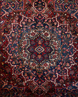 Antique Persian area rug in a living room setting, pile rug, vintage rug, portland, rug shop, bright colors, wild shaman, soft rug, bold color, Portland, Oregon, rug store, rug shop, local shop, antique rug, Persian rug, handmade rug, wool rug