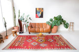 Vintage kilim rug in living room setting, bright colors, wild shaman, soft rug, bold color, Portland, Oregon, rug store, rug shop, local shop, vintage rug, modern kilim