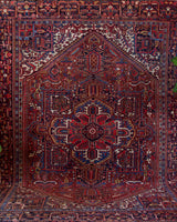 Antique Persian area rug in a living room setting, pile rug, vintage rug, portland, rug shop, bright colors, wild shaman, soft rug, bold color, Portland, Oregon, rug store, rug shop, local shop, antique rug, Persian rug, handmade rug, wool rug