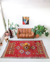Vintage kilim rug in living room setting, bright colors, wild shaman, soft rug, bold color, Portland, Oregon, rug store, rug shop, local shop, vintage rug, modern kilim
